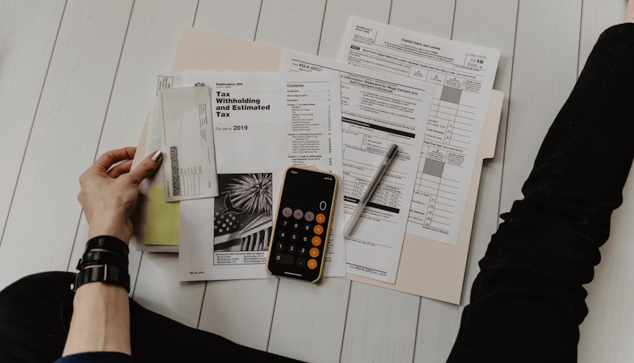 Statements and a calculator laid out on a desk